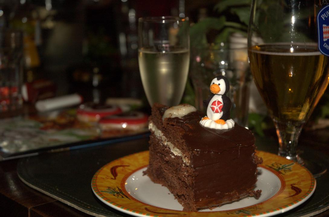 red star penguin birthday cake ornament