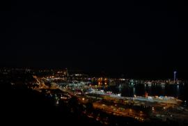 View over Barcelona from Montjuïc: Barceloneta, port, Hotel W (right)/allowallarge