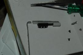 broken ti powerbook g4 (867) left hinge (from user perspective, opposite power cord)/public